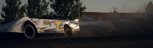 Dirt track race car at dusk, filmed for a motorsports brand film